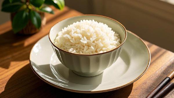 锅煮饭粘锅是怎么回事pg电子试玩平台电饭